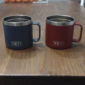 Two Yeti cups